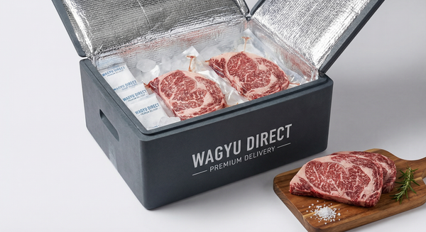 Premium wagyu steaks in insulated shipping box with dry ice