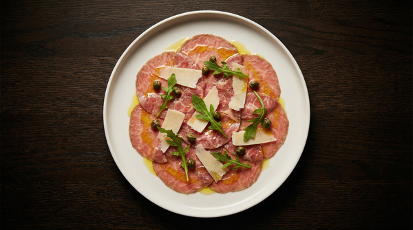 Wagyu beef carpaccio appetizer plated elegantly - AI generated