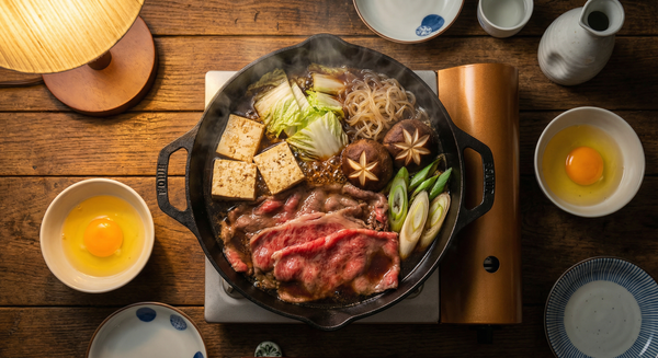 Traditional wagyu sukiyaki hot pot with thin-sliced beef and vegetables