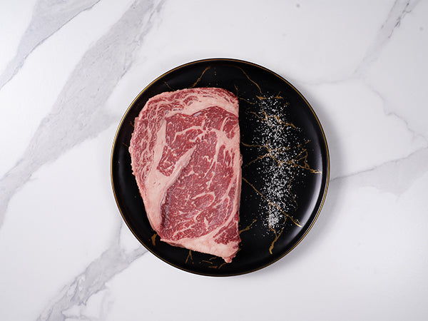 American Waguy Ribeye MS 10 16oz with salt sprinkled