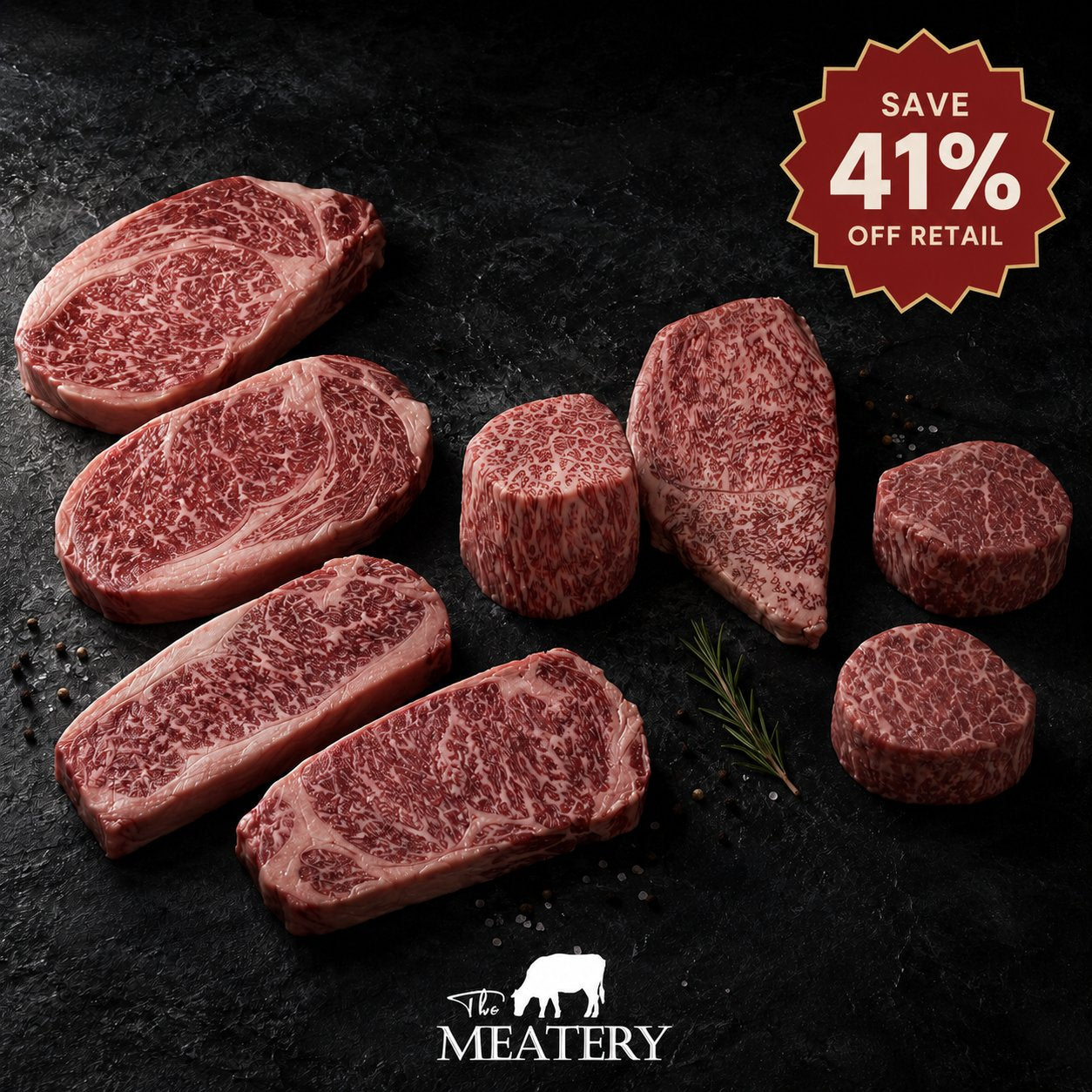 Wagyu Grand Tour 8-Steak Bundle - Japanese A5 Kobe, American Wagyu, and Australian Fullblood Wagyu cuts arranged on dark slate with peppercorns and rosemary