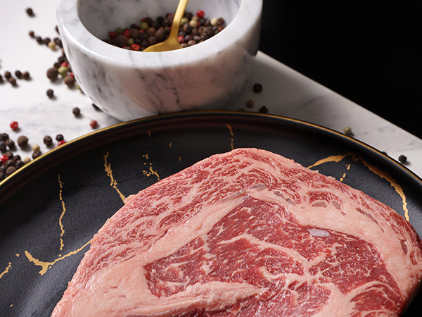 American Waguy Ribeye MS 10 16oz close up high marble